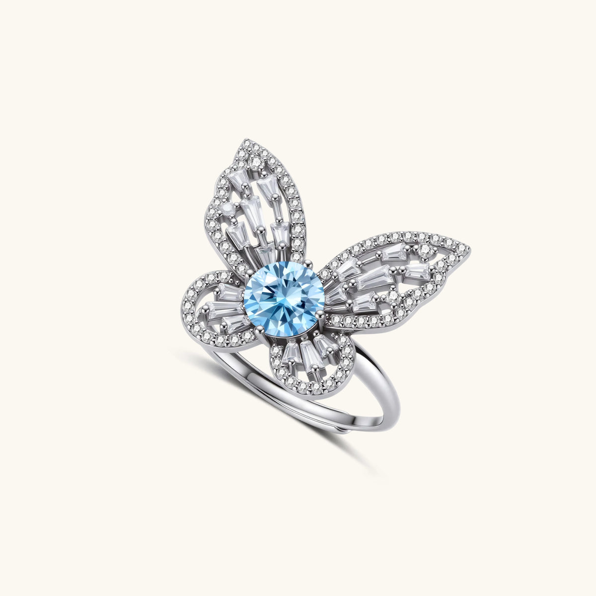 Beautiful Blue Butterfly Moissanite Ring featuring a blue center stone and intricate sterling silver design.