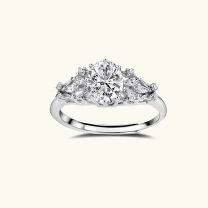 Celestial Promise Ring featuring a moissanite center stone and halo setting in sterling silver, perfect for proposals.