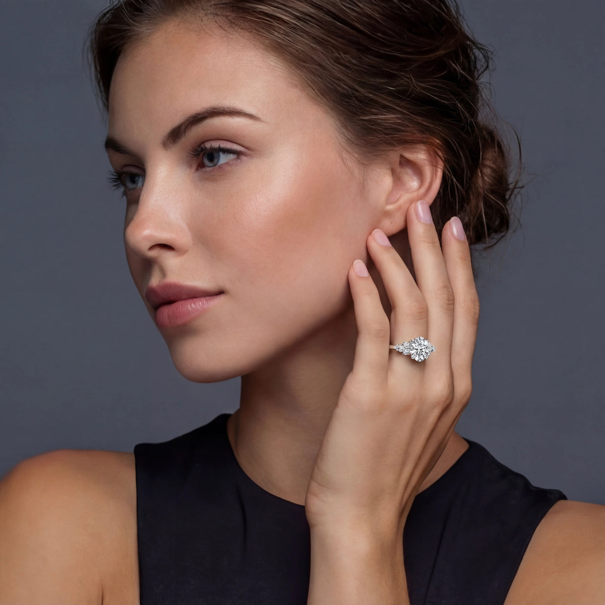 Celestial Promise Ring featuring a moissanite center stone and halo setting in sterling silver, perfect for proposals.