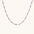 Delicate 18K gold vermeil necklace with alternating lavender zirconia beads and white freshwater pearls on cream background