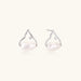Silver mountain outline studs with baroque pearl and diamond accent on white background