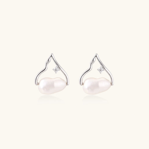 Silver mountain outline studs with baroque pearl and diamond accent on white background