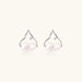 Silver mountain outline studs with baroque pearl and diamond accent on white background