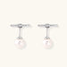 Rhodium-plated sterling silver ear jacket earrings with diamond-set horizontal bar and freshwater pearl drop