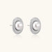Elegant stud earrings with cream freshwater pearls surrounded by sparkly pavé crystals on rhodium-plated silver setting