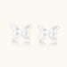 Pair of translucent butterfly-shaped stud earrings with frosted finish and dimensional wing details on white background